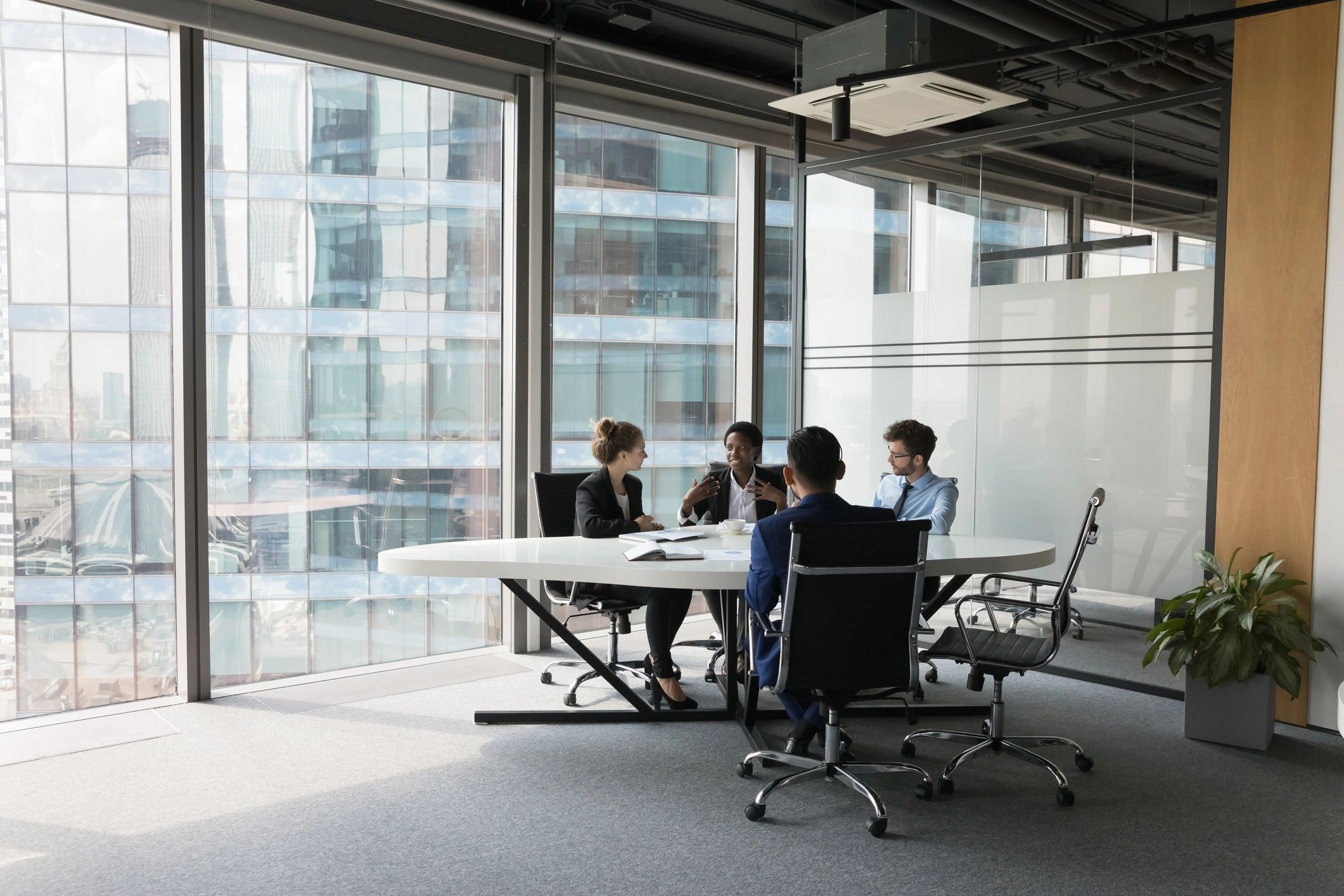 Business technology team meeting in a modern office