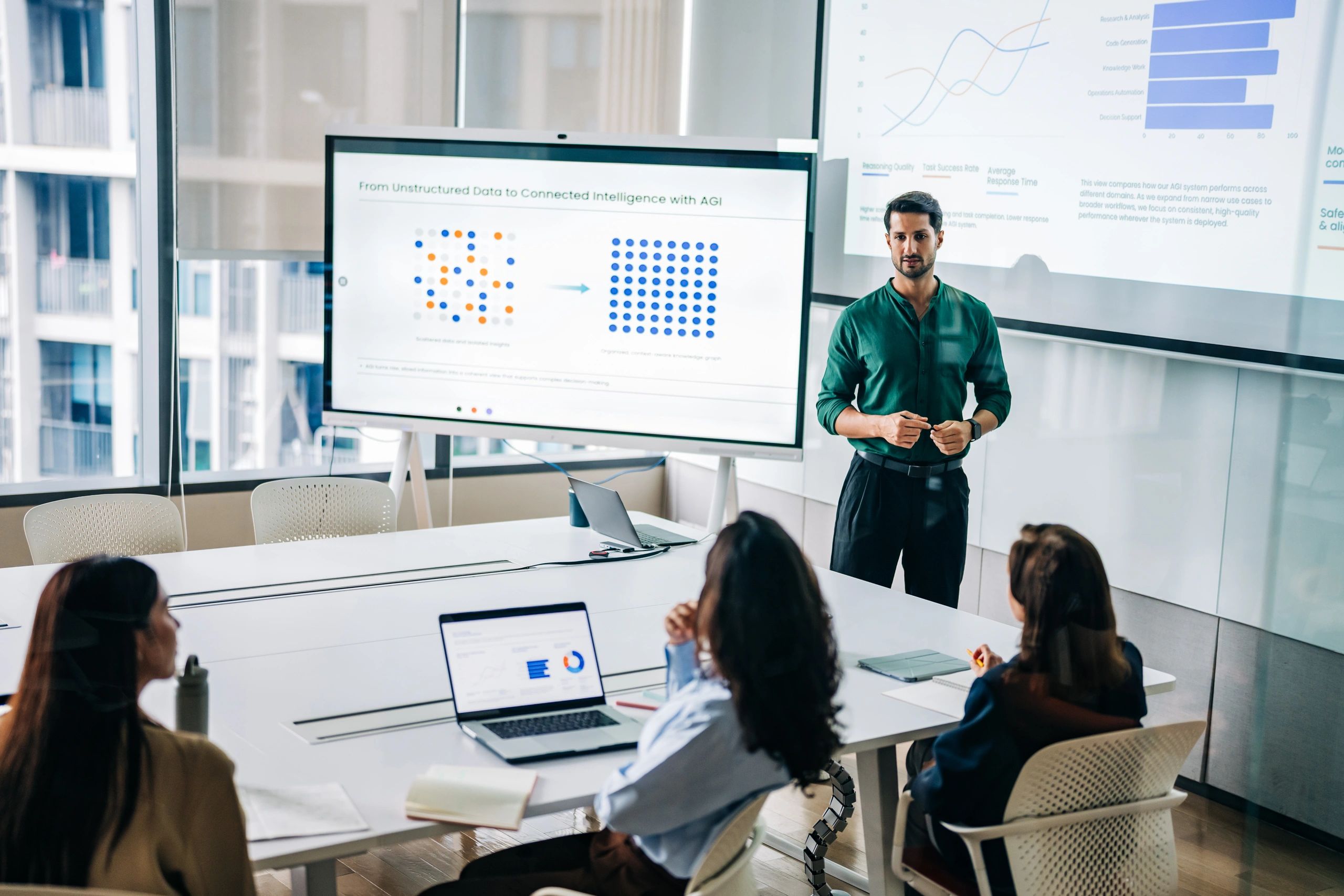Business technology consultant presenting analytics to a team